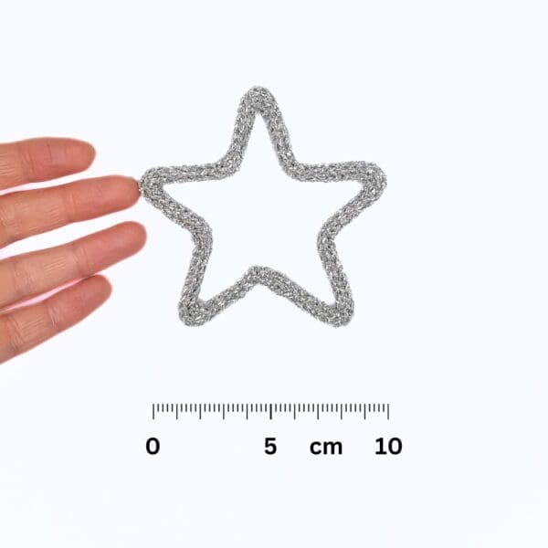 Knitted wire Christmas decoration featuring a silver star