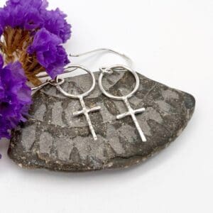 silver drop earrings with a ring and cross design