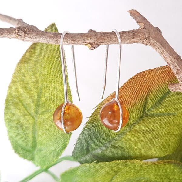 Sterling silver drop earrings with amber.