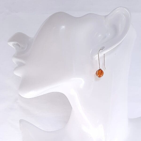 Sterling silver drop earrings with amber.