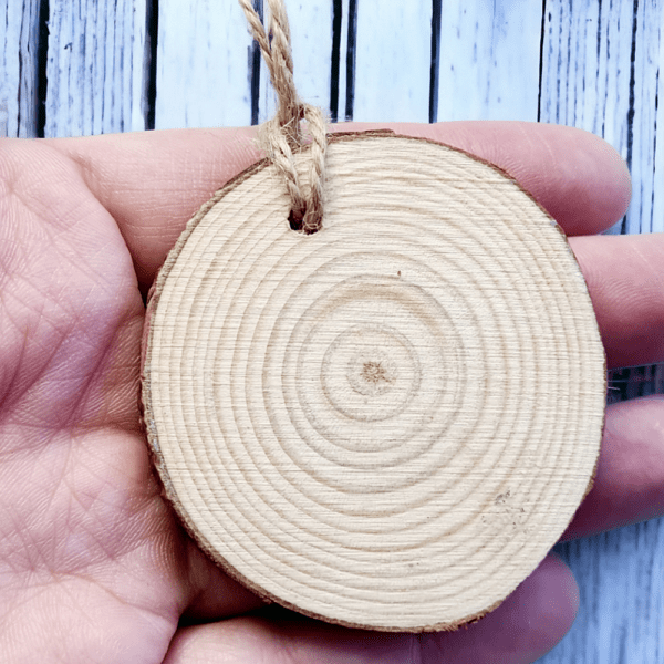 Wooden hanging ornament with resin on