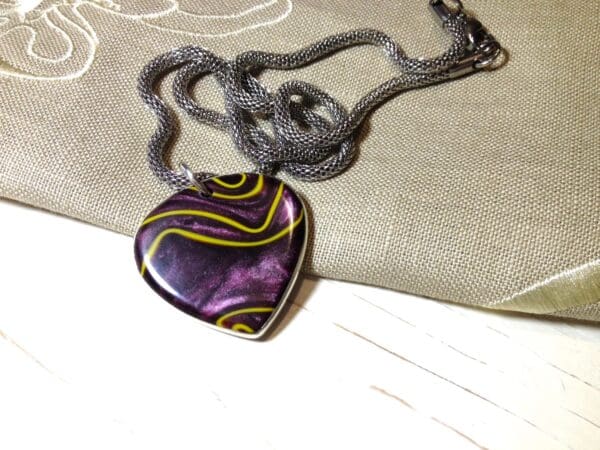 Purple Teardrop Shaped Pendant.