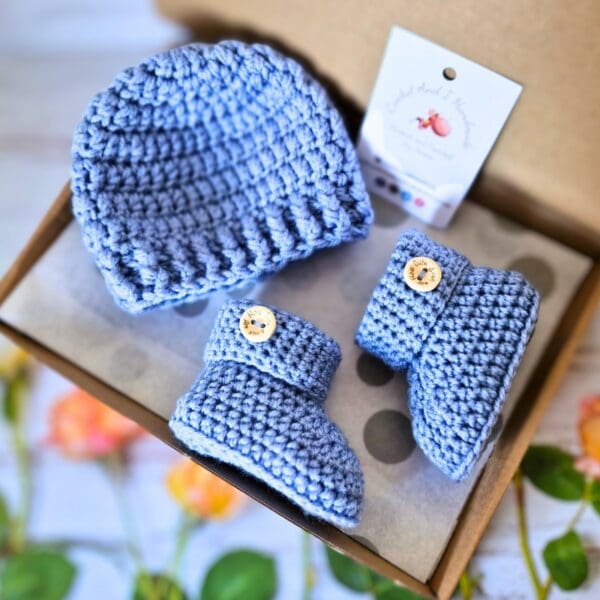 Hand crochet baby gift set including a beanie hat and matching booties. Available in multiple colours and sizes newborn, 0-3 and 3-6 months - a perfect new arrival gift!