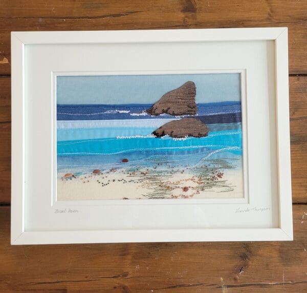 Framed embroidered rocks at low tide at Broad haven beach 43 x 33 cm