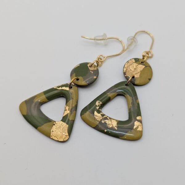 Gold leaf triangle statement earrings in camo green.