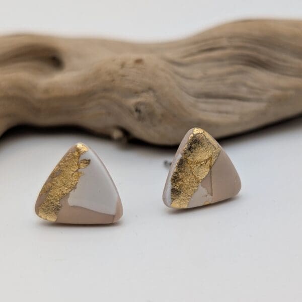 Gold leaf triangle studs in nude pink