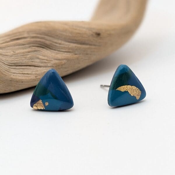 Gold leaf triangle studs in Ocean