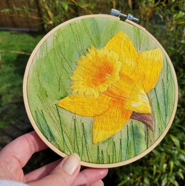 Hand embroidered daffodil 6 inch embroidery hoop.