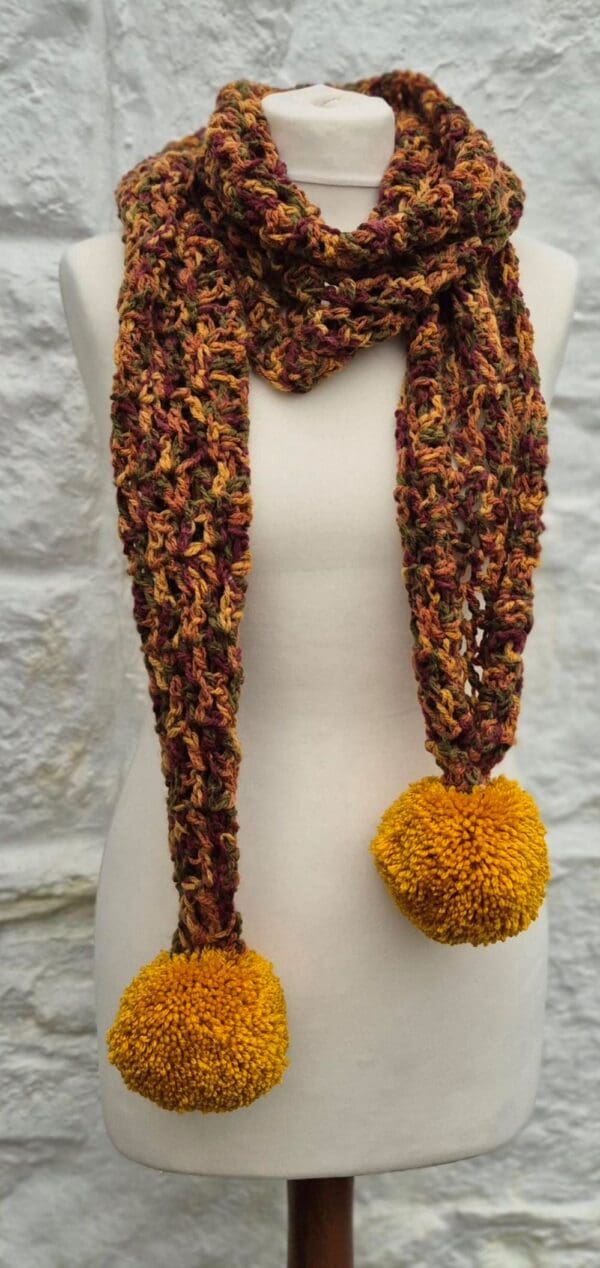 rustic crocheted scarf pom pom