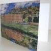 Open view of printed card showing textile art image of Chatswo;rth House and its reflection in a river.