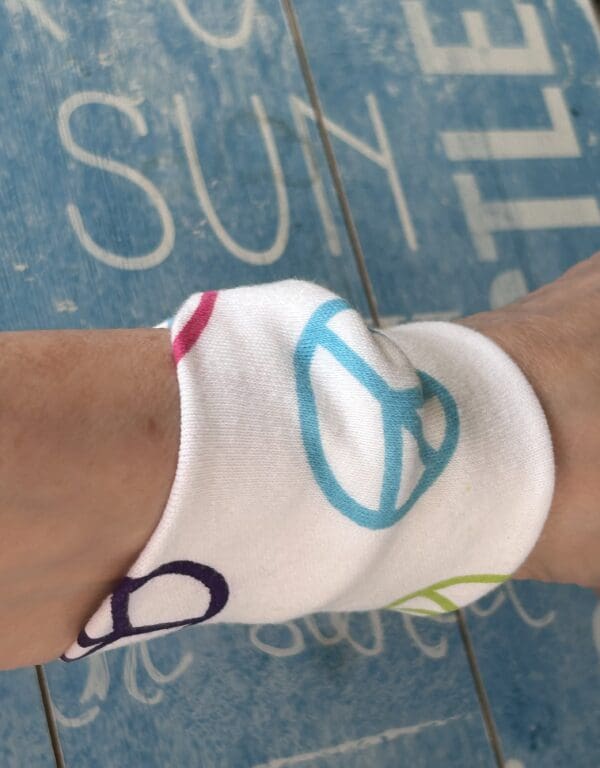 Wide cuff bracelet in peace design fabric ideal for festivals - Image 2