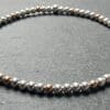 A 3mm beaded sterling silver and rose gold filled bead bracelet