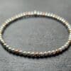 A 3mm beaded sterling silver and rose gold filled bead bracelet