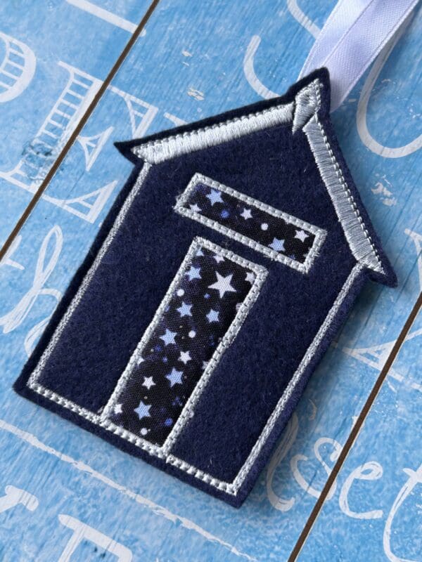 Beach hut embroidery hanging in dark blue and silver thread and white ribbon - Image 4