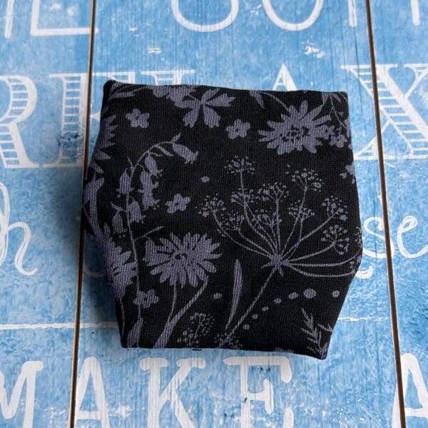 Wide wrist cuff covering in black with flower design - Image 4