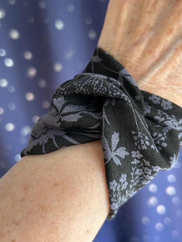 Wide wrist cuff covering in black with flower design - Image 5