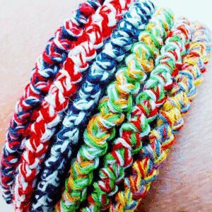 Six crochet cord bracelets in various colours inspired by National flag colours and rainbows.