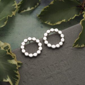 Handmade sterling silver beaded open circle stud earrings, front-facing minimalist design