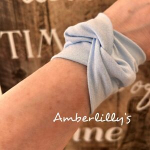 Tattoo wrist cover up in pale blue